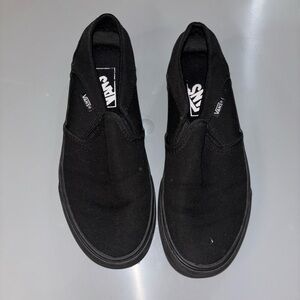 Vans womens Classic Black Slip-On Sneakers